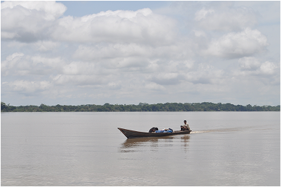 Heading upriver and bringing supplies back for the monsoon season. for 6 months of the year this is not accesible by road.