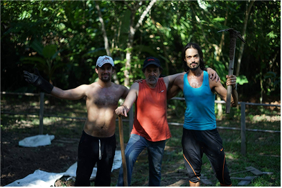 Gardening with Alberto and Werner, preparing a garden bed for an edible garden.